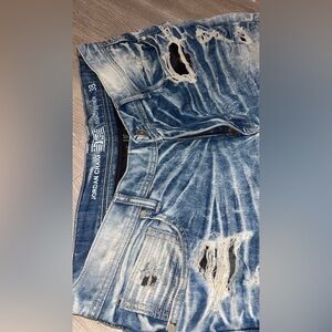 Rare distressed denim shorts from the brand Jordan Craig 38